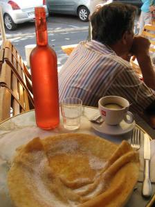 My crepe, cafe and d'leau (tap water) in the orange bottle